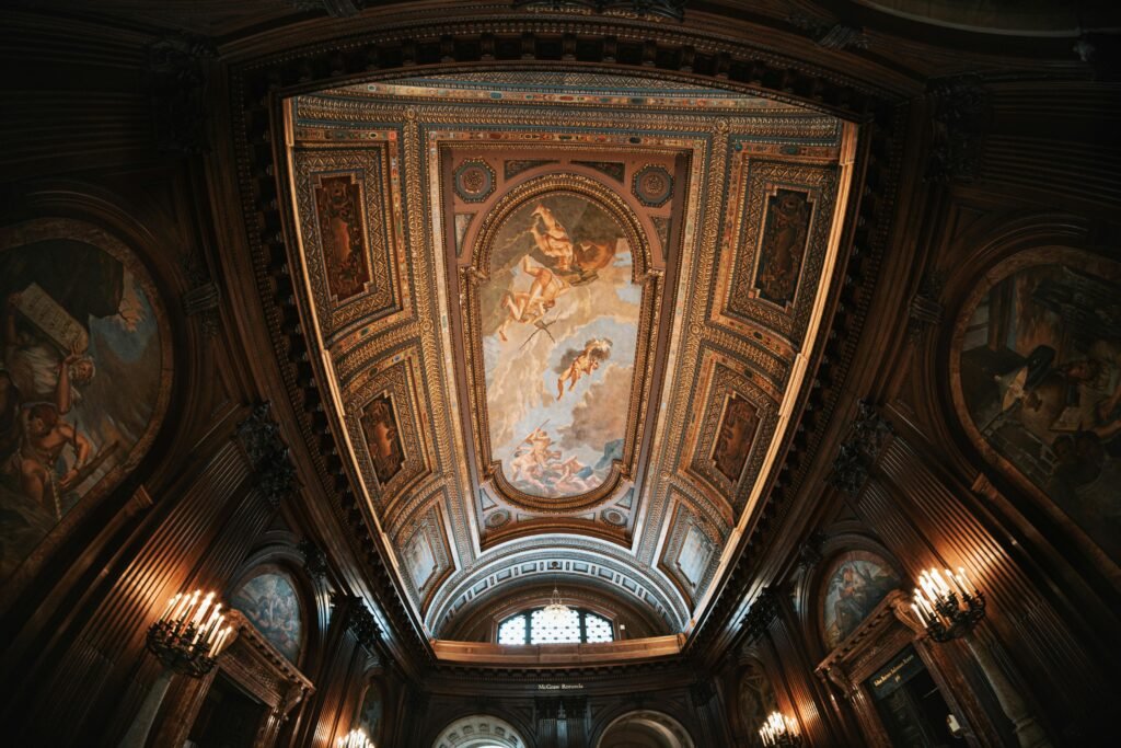 Detailed view of the ornate ceiling in the New York Public Library's interior.